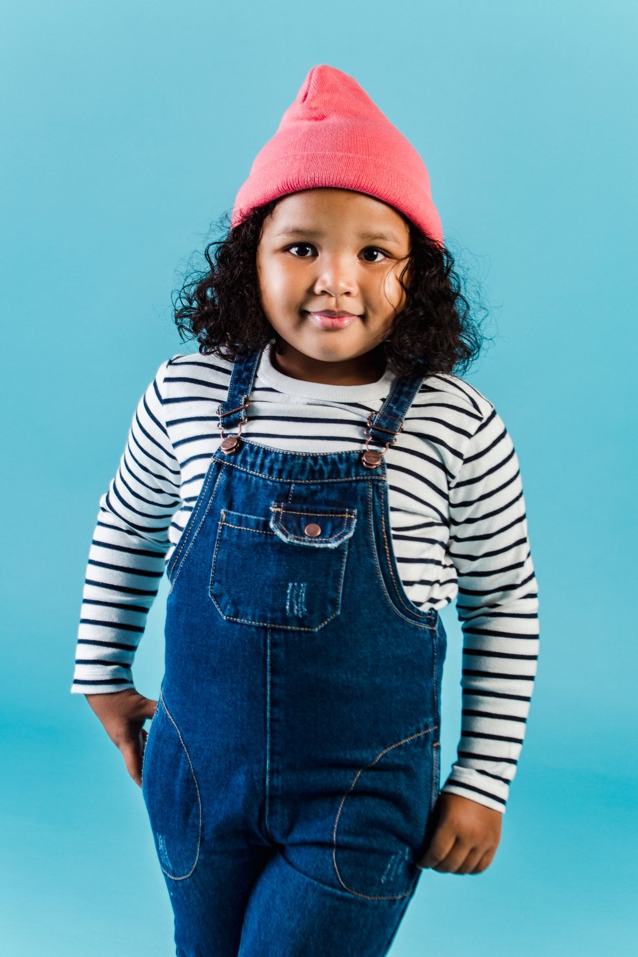 Child in a bright tailored outfit