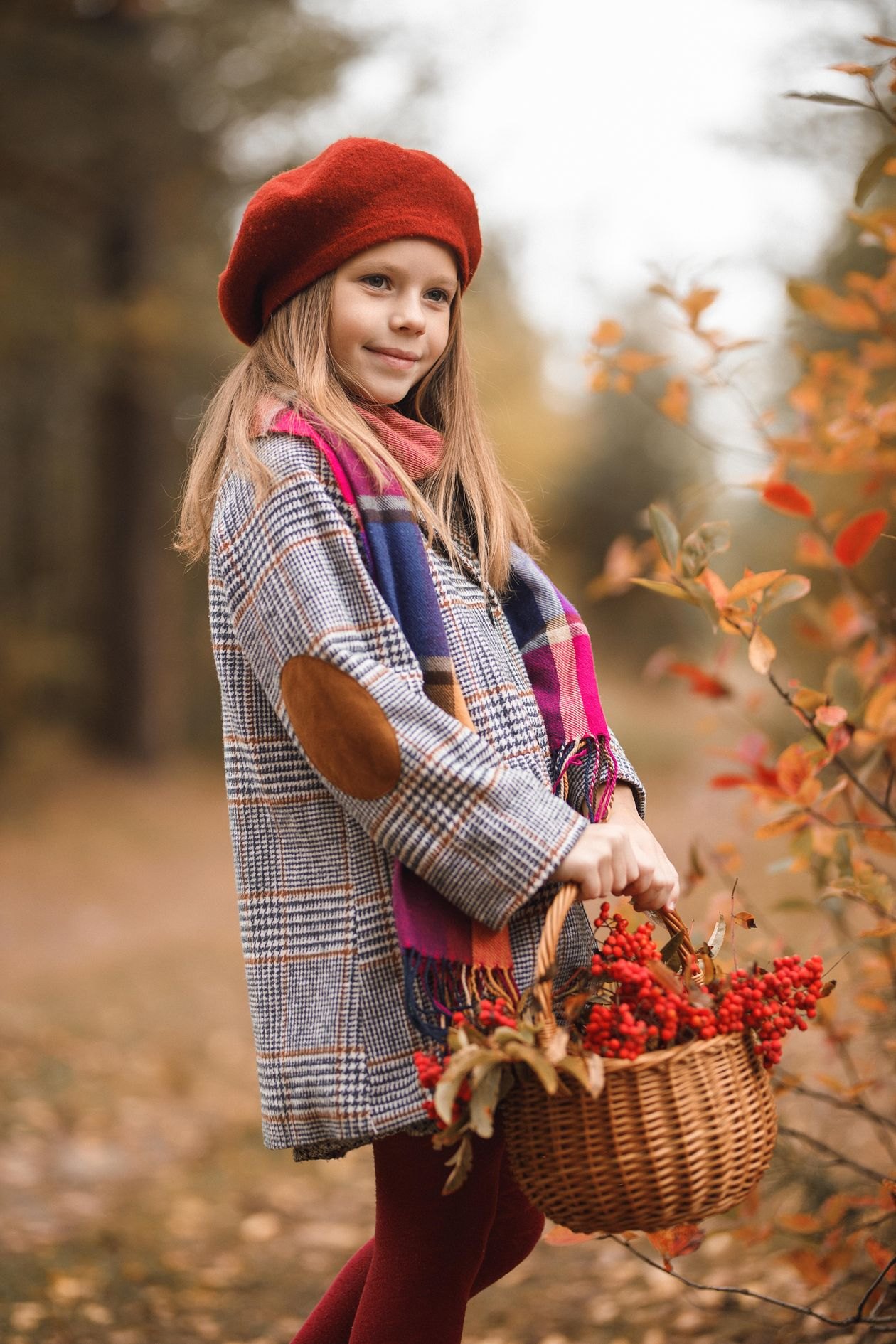 Child in a warm-toned occasion coat